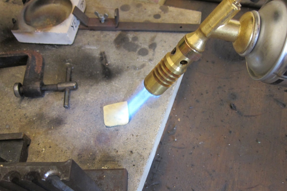 Annealing the gold, makes it more malleable to work on.